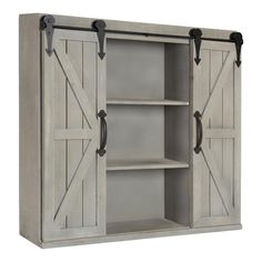 an open cabinet with sliding doors on the front and bottom shelves, in grey wood