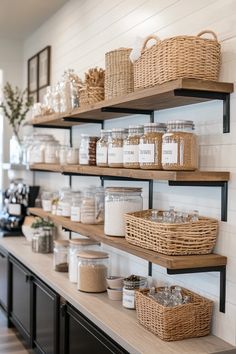 some shelves with baskets and jars on them