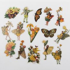 a bunch of stickers that have flowers and fairy figures on them, all in different shapes and sizes