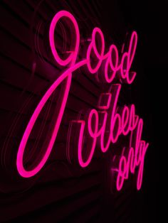 a neon sign that says good afternoon shop