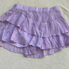 Super Cute, Never Worn Purple Skort Perfect For Summer! Summer Cotton Skort (shorts Skirt), High Waist Cotton Skort With Ruffles, High-waisted Cotton Skort With Ruffles, Summer Mini Ruffled Skirt Bottoms, Tiered Skirt Bottoms With Pockets For Day Out, High Waist Purple Skirt For Summer, Casual Ruffled Skirt For Brunch, Summer Mini Bottoms For Brunch, Summer Ruffled Skirt Bottoms For Brunch