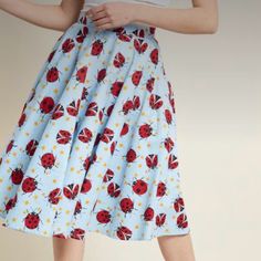 Hell Bunny, High Waisted, Retro, Skirt In Adorable Lady Bug Pattern. Cute Fitted Blue Skirt, Playful Flowy Skirt For Spring, Cute Fitted Light Blue Skirt, Cute Blue Skirt For Spring, Playful Blue Cotton Skirt, Cute Blue Lined Skirt Bottoms, Playful Lined Skirt, Light Blue Knee-length Bottoms For Spring, Playful Fitted Blue Skirt