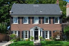 a large brick house with all the parts labeled in front of it's windows