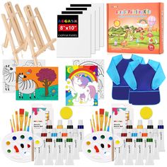 an assortment of children's art supplies including paintbrushes, markers and books