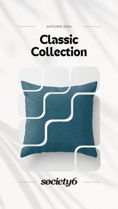 a blue pillow sitting on top of a white wall with the words classic collection above it