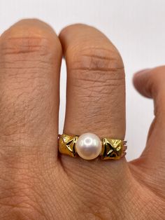 Vintage white cultured pearl  Sterling silver with gold setting   Re sizing has a $20 jeweler's fee. All rings are shipped in a nice gift box.   Check out our over a THOUSAND great reviews Engraving is $4 per letter and is not always perfect depending on the piece. It can take a few days if the jeweler is busy. This is payable to Paypal Judithsltd@gmail.com Luxury Pearl Ring For Gift, Heirloom Akoya Pearl Jewelry For Gifts, Classic Gold Pearl Ring For Anniversary, High-quality 14k Gold Rings For Gift, Gold Pearl Rings As A Gift, Elegant Gold Pearl Ring For Anniversary, Formal Gold Rings With Akoya Pearl, Hallmarked Pearl Ring For Gift, Gold Hallmarked Pearl Ring For Gift