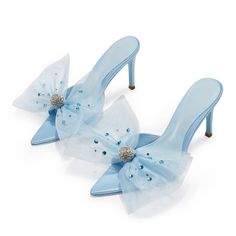 Dazzle in style with these blue pointy toe mule heels. Adorned with sparkling rhinestones and an elegant bow detail, they elevate any outfit with sophistication and charm. Color: Blue Material: Satin and mesh Heel Type: Stiletto heel Heel Height: 3.54" / 90 mm approx Product measurements were taken using size 8. Please note that measurements may vary by size. Toe: Open pointed toe Rhinestone embellished design Mesh bow decor design Handcrafted US sizing. Fits true to size Blue Pointed Toe Heels With Bow, Magical Heels, Light Blue Heels, Bow Mules, Tulle Bow, Heels Blue, Mesh Bows, Mule Heels, Mesh Heels