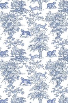 a blue and white wallpaper with animals in the trees on it's side