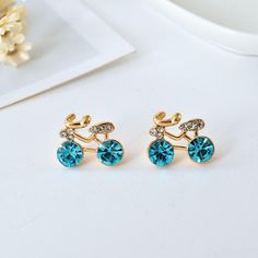 These stunning golden crystal stud earrings are the perfect piece to add some edge to your look. In your choice of 3 main crystal colors available to match your desired outfit. Every piece is beautifully handcrafted in and comes packaged in a smart velvet bag. ✔️ FREE Worldwide shipping, we ship to over 250 Countries! ✔️ 316L Stainless Steel, AAA+CZ Stone ✔️ Scratch-resistant ✔️ Weight 5g ✔️ SUITABLE FOR ANY OCCASION: Popular among Women and girls, fashion design, easy to match any clothes, suit Stone Earrings Studs, Bike Jewelry, Golden Crystal, Gold Jewels Design, Fancy Jewellery Designs, Fashion Enthusiast, Baby Jewelry, Mom Jewelry, Fancy Jewellery