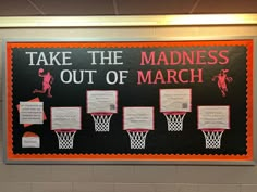 a sign that says take the madness out of march with basketball hoops on it