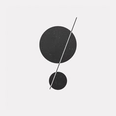 an abstract black and white photo with two circles