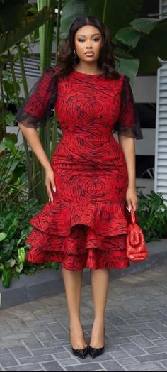 Black Ankara Party Dress, Black Ankara Fabric Party Dress, Red Ankara Fabric Short Sleeve Dress, Red Ankara Party Dress, Red Ankara Fabric Party Dress, Elegant Fitted Ankara Midi Dress, Knee-length Ankara Fabric Party Dress, Knee-length Ankara Midi Dress For Party, Elegant Red Ankara Fabric Dress