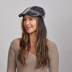 Mikey | Womens Newsboy Flat Cap offers classic charm with a modern edge. Crafted from a lightweight wool and polyester blend, this unbanded Ivy Cap features a 3" brim and a 5" crown height, ensuring a sleek fit and timeless style. Perfect for casual outings or a touch of vintage flair. Material: Lightweight Blend of Wool and Polyester Fabric Shape: Ivy Cap Trim: Unbanded Brim Size: 3” Crown Height: 5” Sweatband: Sewn-in Sweatband Imported Outdoor Flat Cap Hat, One Size Fits Most, One Size Fits Most Flat Cap For Outdoor, One Size Fits Most Outdoor Flat Cap, Casual Plaid Flat Cap, Adjustable Plaid Cap, Casual Plaid Hat With Curved Brim, Casual Plaid Hat For Fall, Adjustable Plaid Hat With Curved Brim, Plaid Adjustable Curved Brim Hat