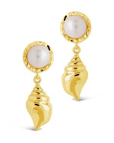 Elevate your style with our Beverly Drops Studs. These exquisite drop earrings feature a delicate combination of shells and pearls, creating a luxurious accessory that will effortlessly elevate any outfit. Make a statement of elegance and sophistication with the Beverly Drops Studs. Material: 14K gold or rhodium plated brass, freshwater pearls Features: 1.2" drop, 0.45" stud, 0.75" charm, 8mm pearls, Lead & Nickel free, post back Shells And Pearls, Solid Gold Bracelet, Solid Gold Earrings, Statement Drop Earrings, Mens Accessories Jewelry, Men Earrings, Free Post, Pearl Shell, Earring Sale