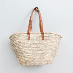 Everyday Woven Leather Straw Basket Bag, Shopping Straw Bag With Rolled Handles, Natural Fiber Straw Bag With Rolled Handles For Shopping, Everyday Palm Leaf Straw Bag With Leather Handles, Natural Woven Leather Straw Bag For Shopping, Palm Leaf Beach Bag With Braided Handles For Shopping, Palm Leaf Basket Bag For Shopping, Natural Straw Basket Bag With Rolled Handles, Natural Basket Straw Bag With Rolled Handles