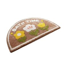 a patch with flowers on it that says bath time