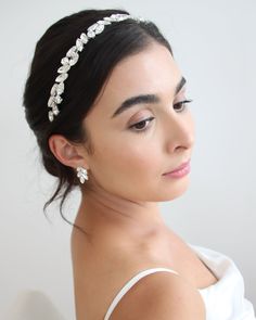 NORA HEADBAND (TI-3417) Perfect for a pop of sparkle to your bridal look, our Nora Crystal Headband is hand wired to perfection with round & marquise crystals in a timeless floral design. Choose between all clear crystals or a mix of opal and clear crystals. DETAILS * Measures 11 inches x .5 inches. * Crafted with all clear crystals or opals & crystals. * Finish: silver. * Flexible, lightweight and easy to style. SHOP MORE STYLES https://www.etsy.com/shop/darethcolburndesigns HELP & Simple Bridal Hair, Hairpiece Wedding, Headband Wedding Hair, Bridal Hair Combs, Bridal Hairpiece, Silver Headband, Headband Wedding, Angel Aura Quartz