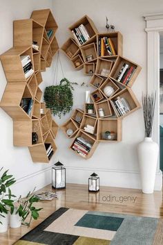 a living room with bookshelves on the wall