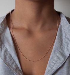 One of our favorite necklaces is the beaded satellite chain. This delicate curb chain is dotted with tiny 2mm beads every 14mm. We love this chain as a single or wrapped around twice as a double. Choose your own perfect length. Details: 14k solid gold chain 14k solid gold clasp * in the images you can see the necklace as a 14, 16,18 and 36-inch examples. The double wrapped necklace is 36 inches. We take pride in offering our customers the very best in fine jewelry. That's why we create stunning Dainty Rose Gold Chain Necklace For Layering, Delicate Rose Gold Chain Necklace For Layering, Minimalist Rose Gold Chain Necklace For Layering, Delicate Satellite Chain Necklace For Everyday, Dainty Rose Gold Chain Necklace With Satellite Chain, Dainty Beaded Chain Necklaces For Layering, Dainty Beaded Chain Necklace For Layering, Delicate Rose Gold Satellite Chain Necklace, Delicate Everyday Satellite Chain Necklaces