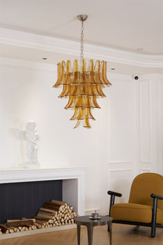 Indulge in luxury and artistry with our Murano Chandelier. Made in Italy, this exquisite piece features the finest glass and intricate design that adds timeless elegance to any space. With exceptional craftsmanship, it brings sophistication to your home. Elevate your decor with this true representation of fine craftsmanship.