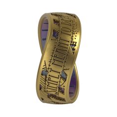 a gold ring with the words harry potter on it