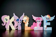 the letter e is made out of cutouts of pony ponies