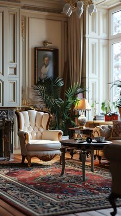 a living room filled with furniture and a chandelier