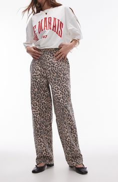 A fierce animal print covers these trouser-inspired jeans designed with relaxed straight legs and a comfortable high waist. 28 1/2" inseam; 17 1/2" leg opening; 13" front rise; 15 1/2" back rise (size 8) Zip fly with button closure Side-seam pockets; back patch pockets 100% cotton Machine wash, line dry Made in Turkey Topshop Jeans, Print Trends, Straight Leg Denim, Maxi Dress Trend, Designer Jeans, Swimwear Sale, Fall Style, Hoodies For Sale, Petite Maternity