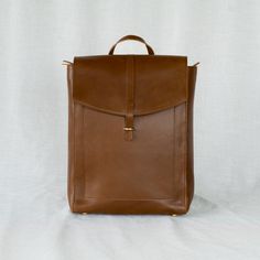 Atlas leather backpack product shot in Chestnut