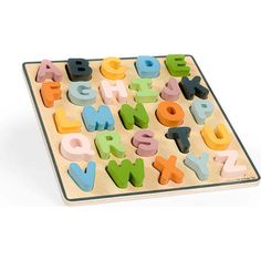 a wooden alphabet puzzle with letters and numbers on the front, including one letter in different colors