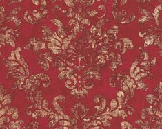 a red and gold wallpaper with an ornate design on it's surface,