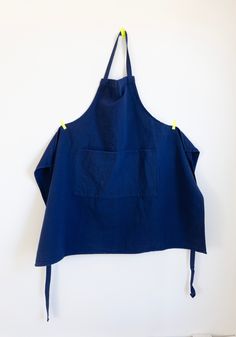 Apron in Cobalt is an essential for the kitchen. Made from high-end professional linen cotton blend in brilliant cobalt blue. Blending these two fibers creates a fabric that is soft and comfortable, but also strong and durable. It is highly absorbent, which makes it great for use in the kitchen. Features a large front pocket and adjustable tie back. Cotton is known for its softness, while linen is known for its durability. Blending these two fibers creates a fabric that is soft and comfortable, Kitchen Features, Tie Back, Christmas List, Cobalt Blue, Front Pocket, Cobalt, Blending, The Kitchen, Apron