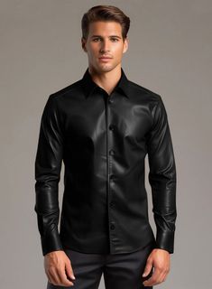 A true fashion piece that offers an edgy flair to your classy ensemble with lasting perfection is our Regal Black Leather Shirt. Tailored from pure napa leather, our black shirt boasts astonishing detailing and all-day comfort, offering a style endeavor beyond compare.  Be the owner of the finest leather shirt that will enhance your overall look for your next casual hangout or chill aura at an art opening gala. Shop today!   Made Using Pure Napa Sheep Skin Soft Leather    Look Includes     Black    Default Buttons     Click 'Customize Now' to modify the look if needed.    Made as per your measurements.