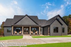 this is an image of a house in the country side with front porch and covered patio