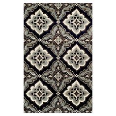 a black and white rug with an intricate design