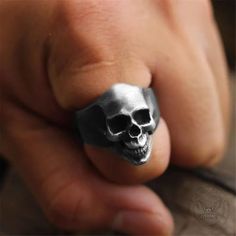 This is a non-traditional skull ring due to its unique design. An awesome example of the talent of our artisan jewelers. Buy 2 get 1 free! Handmade Unique Metal Skull Ring, Hand Cast Metal Skull Ring For Gift, Halloween Skull Print Ring As A Gift, Hand Cast Skull Ring For Halloween Gift, Collectible Hand Cast Skull Rings, Unique Skull Rings For Gifts, Symbolic Stainless Steel Skull Ring As Gift, Handmade Metal Skull Ring, Handmade Metal Skull Ring Collectible