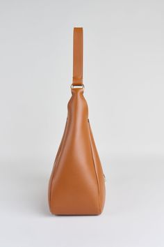 Our napa leather hobo bag is designed with a beautiful gold closure & interior slip pocket. Elie Tahari Napa Leather Hobo Handbag 100% Leather Made in Italy Leather Hobo Handbags, Hobo Handbag, Italian Craftsmanship, Leather Hobo Bag, Elie Tahari, Hobo Handbags, Leather Hobo, Nappa Leather, Global Fashion