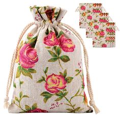 a drawsack bag with pink flowers on it and two tags hanging from the side