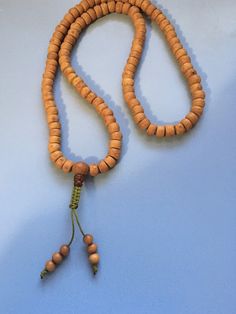 Bodhi Seed Mala Necklace Light shade handmade with adjustable knot and Sandalwood end beads Holistic Necklaces With Wooden Beads For Festivals, Holistic Festival Necklaces With Wooden Beads, Hand-strung Adjustable Natural Necklace, Holistic Hand Knotted Jewelry For Rituals, Artisan Adjustable Wooden Beaded Necklaces, Adjustable Brown Hand Knotted Beaded Necklace, Adjustable Brown Hand-knotted Beaded Necklace, Adjustable Hand Knotted Brown Beaded Necklace, Natural Wooden Beads Spiritual Jewelry