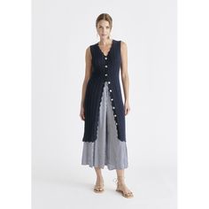 This dress, crafted from a cosy cotton mix, features intricate pointelle knit detailing for a touch of elegance. Wear it as a standalone dress for a chic look, or unbutton it and layer over trousers for a fashion-forward ensemble. The adaptability of this dress makes it a go-to piece for both casual and elevated occasions, ensuring you effortlessly embody modern sophistication and comfort.  V scallop neckline and hem, button blacket. Perfect for: Work and weekends. COMPOSITION: 85% Cotton 15% Ny Spring Knit Midi Dress For Loungewear, Elegant Knit Dress For Loungewear, Summer Knit Dresses For Work, Elegant Crochet Midi Dress For Daywear, Elegant Midi Length Crochet Dress For Daywear, Summer Knit Dress For Loungewear, Chic Cotton Dresses For Layering, Knit Summer Workwear Dresses, Knitted Cotton Dresses For Spring