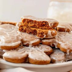 several glazed donuts stacked on top of each other