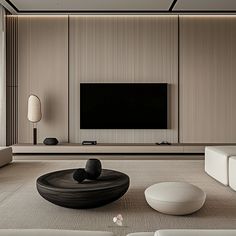 a modern living room with white furniture and a flat screen tv mounted on the wall