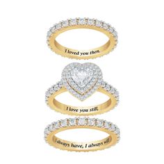 An exquisite reminder of your precious love story…The sparkle of over 100 Diamonisse simulated diamonds.Three enchanting 14kt gold-plated eternity bands represent your lifetime of love – yesterday, today and tomorrow.A showstopping simulated diamond center heart forms the crowning centerpiece of this magnificent ring set.The inside of the bands are inscribed with a touching sentiment.Arrives in our Danbury Mint Signature Packaging – perfect for gift-giving and safekeeping, included at no additio Anniversary Stackable Halo Rings In Cubic Zirconia, Personalized Cubic Zirconia Promise Ring, Anniversary Cubic Zirconia Eternity Band With Halo, Anniversary Eternity Band With Halo Cubic Zirconia, Cubic Zirconia Halo Eternity Band For Anniversary, Anniversary Cubic Zirconia Stackable Rings, Stackable Cubic Zirconia Eternity Band For Anniversary, Valentine's Day Anniversary Jewelry With Halo Detail, Valentine's Day Anniversary Jewelry With Halo