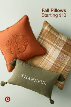 three pillows with embroidered pumpkins on them and the words, fall pillows starting $ 10