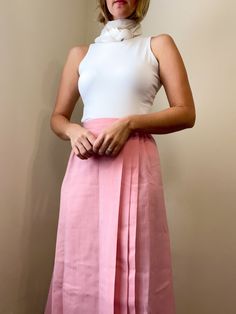 ⚡️ sweet high waisted a-line wrap skirt with accordion pleats at the front. beautiful soft pink color. made by Fundamental Things. 50% polyester 50% rayon. excellent condition! ⚡️ labeled size 14 (modeled on size small, 5'5") ⚡️ waist 15"  hips 19.5" length 27.5" ------------------------------------------------------------------------------------------- Please message questions prior to purchase. Once shipped, sales are final, no return/exchange. But please contact me if you have any problems wi Feminine Fitted A-line Skirt, Elegant A-line Pleated Tennis Skirt, Chic A-line Pleated Skort, Pink Pleated A-line Skirt, Pink A-line Pleated Skirt, Full Pleated Skort, Pleated Flared Mini Skirt In Feminine Style, Chic Pleated Full Skirt Skort, Spring Pleated A-line Tennis Skirt