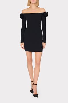 The coziest cocktail dress ever—this stunning, yet comfy, number is cut from a ribbed knit fabrication. Its off-the-shoulder silhouette fits close to the body and has rosette details at each shoulder. Style it with heels and silver jewelry for a night out. Chic Evening Ribbed Bodycon Dress, Off-shoulder Ribbed Bodycon Dress, Chic Ribbed Bodycon Evening Dress, Chic Ribbed Bodycon Dress For Evening, Evening Ribbed Mini Sweater Dress, Evening Mini Ribbed Sweater Dress, Chic Ribbed Party Dress, Evening Ribbed Bodycon Dress, Fitted Ribbed Off-shoulder Mini Dress