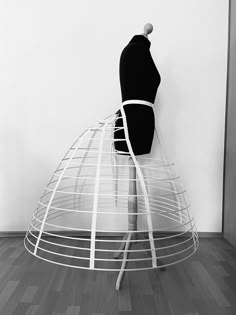 This Crinoline is based on the popular cage crinolines of the 1860s.  They were worn by women of every social standing and class across the Western world, from royalty to factory workers.  They are made to hold out the skirt of a women's dress.  It was very easy and comfortable to wear, compared to the many layered skirt worn before.  This one is an elliptical hoop skirt. Its is closed in front with a clasp. Material:  It is made from cotton batiste, spring steel.  Size: If you are unsure what size you are, please see size chart Cage Crinoline, Victorian Petticoat, Victorian Corset, Camille Claudel, Hoop Skirt, Womens Costumes, Spring Steel, Layered Skirt, Women's Costumes