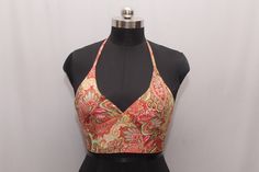 This silk halter top has been handcrafted in India using Silk Clothes It is reversible so you get two tops in one! It wraps around your chest very comfortably and the material is so soft and nice to wear. Featuring a deep plunging v neck and strong back ties which will provide a very good support for the breast and it reveals the back. Free size top **Wholesale enquiries are welcome ** Silk Halter Neck Top For Summer, Summer Silk Choli For Party, Festive Sleeveless Summer Crop Top, Festive Sleeveless Crop Top For Summer, Summer Party Silk Choli, Sleeveless Silk Halter Top For Summer, Halter Neck Top With Built-in Bra For Festival, Festival Halter Neck Top With Built-in Bra, Bohemian Silk Choli For Summer