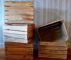 three wooden crates stacked on top of each other