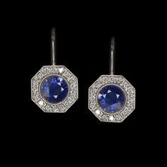 These gorgeous vintage inspired diamond and sapphire earrings are beautifully designed to capture the glamour and romantic style of vintage design! The rich blue sapphire centers are perfectly set off by the bright white accent diamonds. Finished with fine milgrain details, the octagonal halos gi... Dangle Art, Art Deco Glamour, Blue Gemstone Earrings, Sapphire And Diamond Earrings, Art Deco Wedding Band, Blue Crystal Earrings, Deco Earrings, Diamond Engagement Ring Set, Rose Engagement Ring